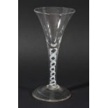 WINE GLASS, circa 1760, the drawn trumpet bowl above a single series opaque twist stem with a pair