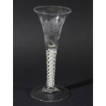 WINE GLASS, the flared trumpet bowl with Jacobite style engraving of a rose and butterfly on a