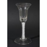 WINE GLASS, circa 1760, the bell shaped bowls with bead inclusion base on a double series opaque