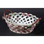 WORCESTER TWO HANDLED BASKET, circa 1760-70, painted with flowers to the centre and sides, the