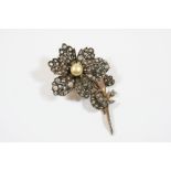 A VICTORIAN DIAMOND FOLIATE BROOCH set overall with cushion-shaped and rose-cut diamonds, the