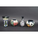 MOORCROFT VASES 4 modern Moorcroft vases including one in the Kaffir Lily design, designed by