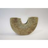 ALAN WALLWORK (BORN 1931) a stoneware wedge form vessel, with internal pierced holes. Also with a