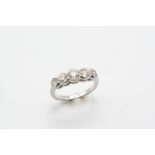 A DIAMOND FIVE STONE RING the five graduated circular-cut diamonds weigh approximately 1.50 carats