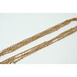 A 9CT. GOLD FETTER LINK CHAIN 120cm. long, 16 grams.