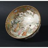 JAPANESE SATSUMA BOWL, Meiji, a scene of figures in a garden before mountains inside a panelled