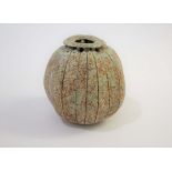 ALAN WALLWORK (BORN 1931) a stoneware pod form vessel, with a circular opening to the top and
