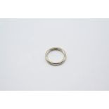 AN 18CT. WHITE GOLD WEDDING BAND 4.2 grams. Size L.