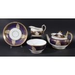 MILES MASON TEA SERVICE, early 19th century, with gilt decoration on a cobalt ground, comprising