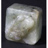 CHINESE GREY GREEN JADE SEAL, of square form with a carving of Shoulao to the top and a six