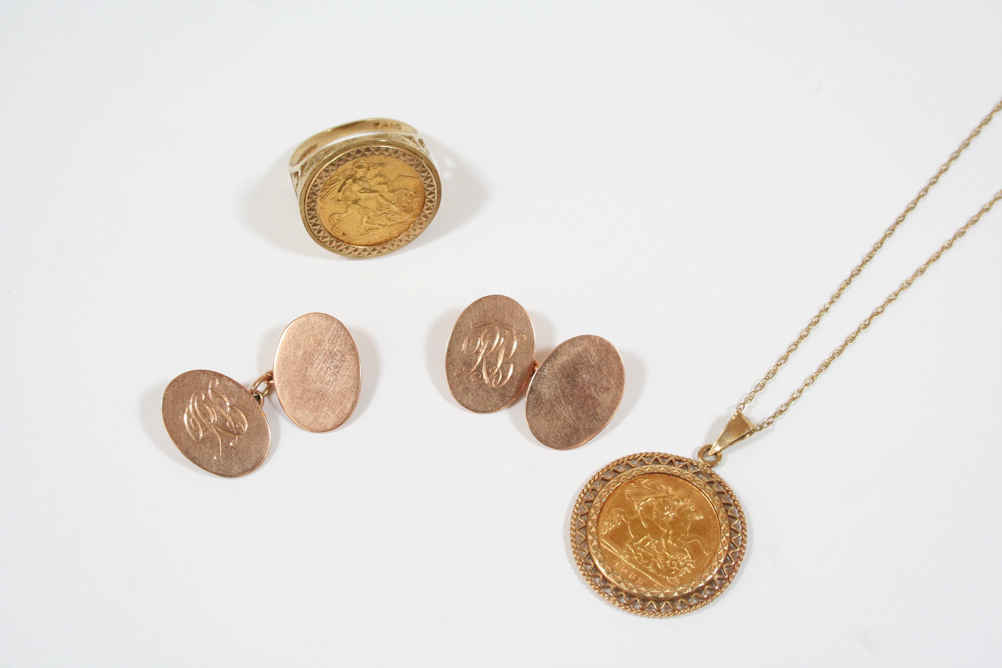 A GOLD HALF SOVEREIGN 1982, in a 9ct. gold pendant mount, 6.3 grams, together with a gold half