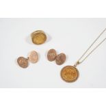 A GOLD HALF SOVEREIGN 1982, in a 9ct. gold pendant mount, 6.3 grams, together with a gold half