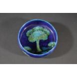 MOORCROFT BOWL - MOONLIT BLUE the bowl painted in the Moonlit Blue design, the trees painted