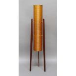 RETRO ROCKET LAMP a mid 20thc lamp with a cylindrical spun fibreglass shade, mounted on slender teak