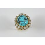 A TURQUOISE MATRIX AND PEARL CLUSTER RING the oval-shaped turquoise matrix is set within a