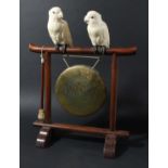 PAIR OF JAPANESE IVORY LOVEBIRDS, late 19th century, with mother of pearl eyes and bronze feet,