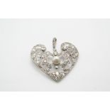 AN ART DECO DIAMOND AND PEARL PENDANT the openwork foliate scrolling mount is set with graduated old