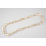 A SINGLE ROW UNIFORM CULTURED PEARL NECKLACE the pearls measure approximately 9.0mm. and are set