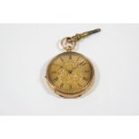 AN 18CT. GOLD OPEN FACED POCKET WATCH the gold foliate dial with Roman numerals, with foliate