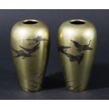 PAIR OF JAPANESE BRASS AND INLAID VASES, of ovoid form, decorated with birds in flight over grasses,