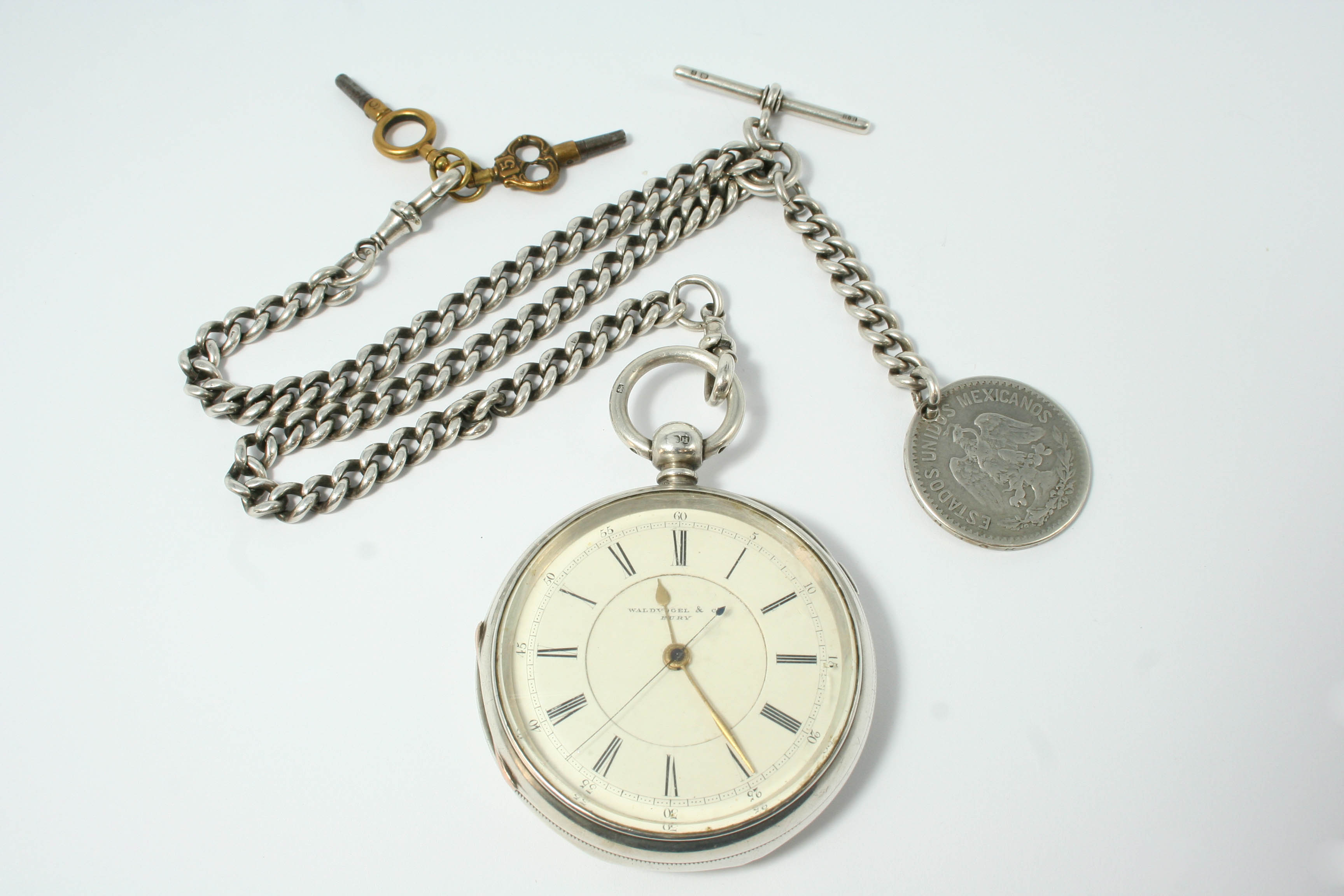 A SILVER OPEN FACED POCKET WATCH the white enamel dial signed Waldvogel & Bury and with Roman