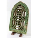 NORTH INDIAN TERRACOTTA JALI WINDOW, perhaps 17th century, with a green glaze, 40cm x 24.5cm