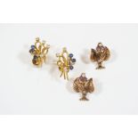 A PAIR OF SAPPHIRE AND DIAMOND EARRINGS of foliate design, mounted with circular-cut diamonds and