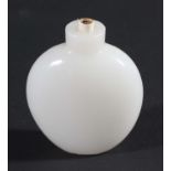 CHINESE WHITE GLASS SNUFF BOTTLE, of flattened ovoid form, lacking stopper, height 5.5cm