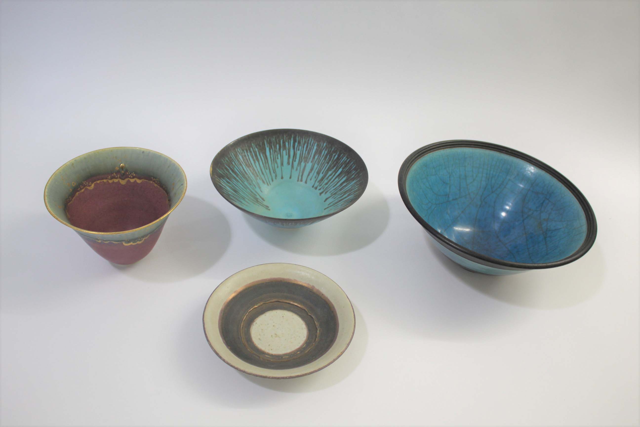 STUDIO POTTERY including a porcelain bowl by Maureen Shearlaw, with a pink and green glazed interior