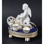 ENGLISH PORCELAIN INKWELL, early 19th century, possibly Chamberlains, Worcester, modelled as cupid