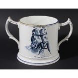 PEARLWARE LOVING CUP, circa 1860, blue transfer printed with reversible, satirical scenes titled The