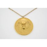 GERALD BENNEY AND DAVID WYNNE A 22ct. gold 'Wild Life' medallion, in a pendant mount, of circular