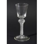 GEORGIAN WINE GLASS, the bucket shaped bowl above a multiple spiral air twist stem with shoulder