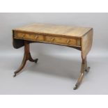 REGENCY ROSEWOOD AND BRASS INLAID SOFA TABLE, in the manner of John McLean, the rounded