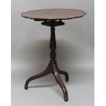 GEORGE III MAHOGANY BIRDCAGE TRIPOD TABLE, the shaped circular top with a beaded rim on a baluster