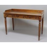 WILLIAM IV MAHOGANY WRITING TABLE, the top with three quarter gallery above three drawers, the