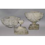 PAIR OF CARVED STONE JARDINIERES, 18th century, the bowls carved in high relief with masks and