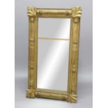 GILTWOOD PIER MIRROR, 19th century, the rectangular plate inside a column frame with stiff leave