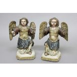 PAIR OF CARVED WOOD AND POLYCHROME PAINTED FIGURES OF ANGELS, perhaps 17th or 18th century, modelled