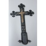 SPANISH WROUGHT IRON CROSS, after Gaudi, applied with a copper cross, trefoil finials and dragons
