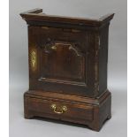 OAK SPICE CUPBOARD, late 17th or early 18th century, the panelled door enclosing a fitted