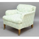 LENYGON & MORANT LTD 'HOWARD' ARMCHAIR, in green printed H&S fabric, the underside with a printed