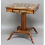 ANGLO INDIAN SATINWOOD AND EBONY GAMES TABLE, 19th century, the top with chequers board and