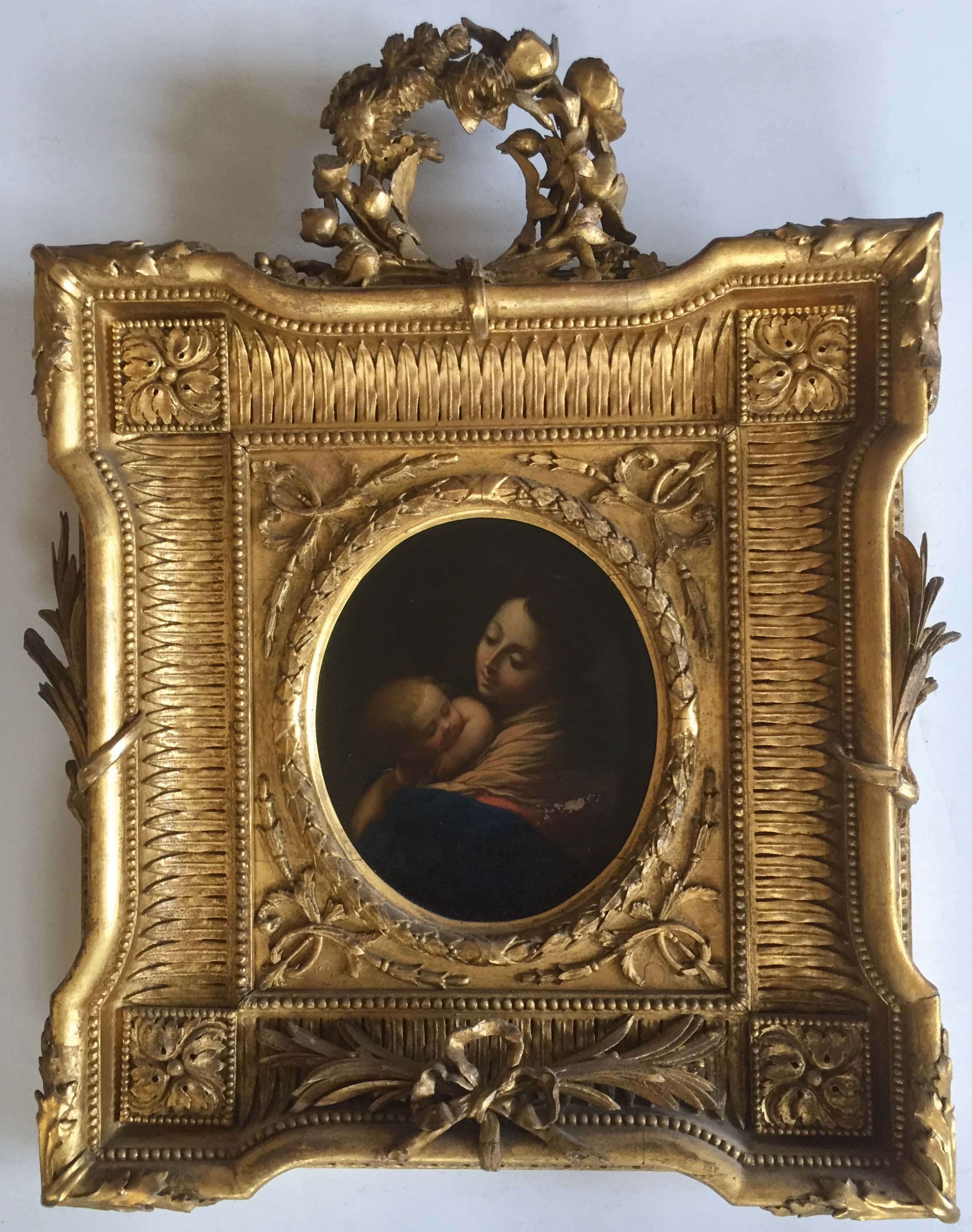 MANNER OF BARTOLOMEO SCHEDONI (1570-1615) VIRGIN AND CHILD Oil on copper, oval, in a fine decorative