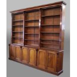 VICTORIAN MAHOGANY LIBRARY BOOKCASE, the moulded cornice above three sections of adjustable shelving