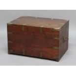CAMPAIGN STYLE CAMPHOR AND BRASS BOUND TRUNK, 19th century, with vacant interior and iron carry