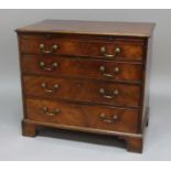 GEORGE III MAHOGANY CHEST, late 18th century, with a brushing slide above four, graduated long