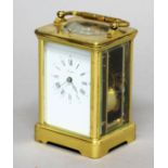 FRENCH BRASS REPEATING CARRIAGE CLOCK, the enamelled dial inscribed Angelus on an eight day movement