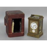 FRENCH BRASS CARRIAGE CLOCK, the 2" enamelled dial with black roman numerals and gilt star half