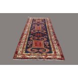 SHIRVAN RUNNER, South East Caucasus, circa 1900, the indigo field with three latch hook panels